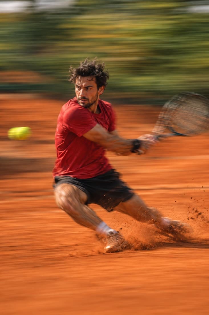 Sliding backhand on clay